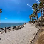 Bungalow playa Águila terraza piscina by Lightbooking