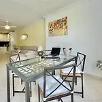 Golden Palm Tree Apartment